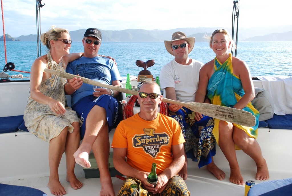 The crew of Synchronicity featuring the Multihull Trophy and the Grotty Oar - Bay of Islands Marine Centre 2010 Bay of Islands to Whangaroa Race © Andy Greager